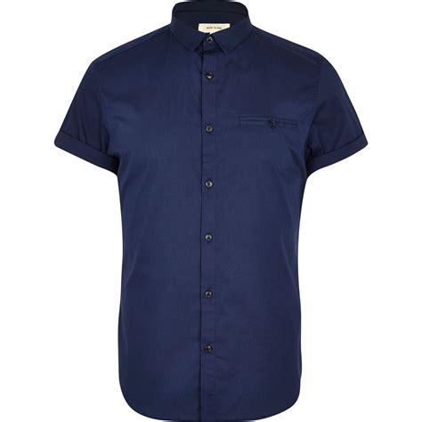 navy blue short sleeve shirt.